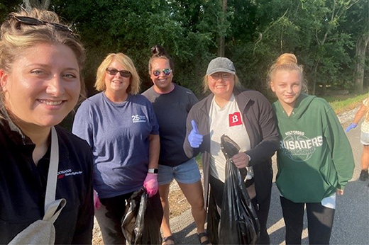 Group of Buchanan Employees cleaning up the Fort Wayne River Greenway