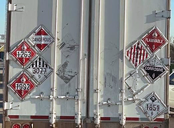 Hazardous materials truckload shipment prepared for commercial transportation by Buchanan Hauling and Rigging.