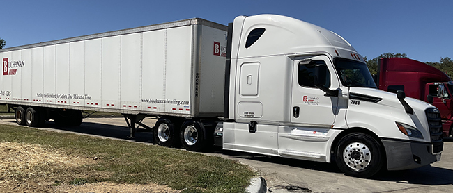 Buchanan Hauling dry van truck supporting recurring freight transportation for a manufacturing customer.