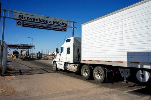 Buchanan Hauling truck transporting industrial freight as part of a cross border commercial shipment.