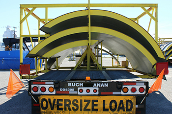 Buchanan Hauling heavy haul equipment transporting oversized industrial freight on a cross border route.