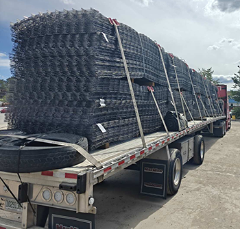 Buchanan Hauling flatbed truck providing open deck freight capacity for an industrial customer.