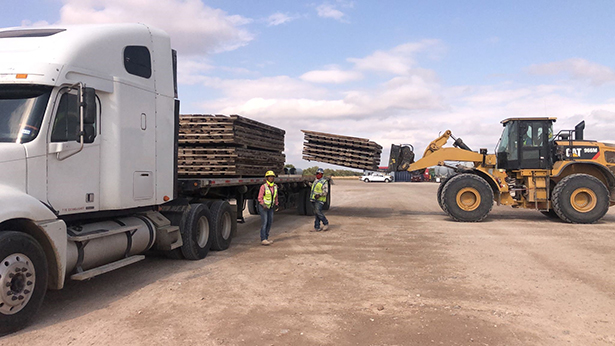 Industrial freight loaded on Buchanan Hauling flatbed equipment for commercial transportation.
