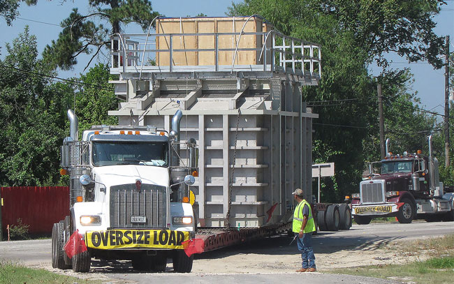 Buchanan employee helps a driver navigate his oversized load