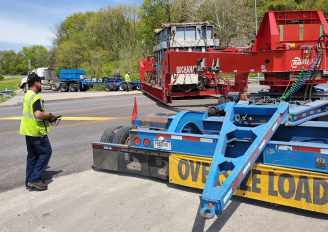 Buchanan Tiller drives the rear section of our heavy haul trailer around hard corners