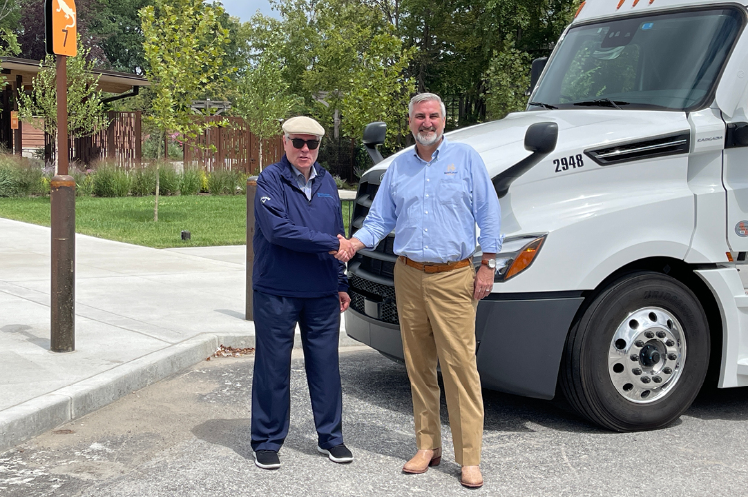 Geary Buchanan and Governor Eric Holcomb shaking hands