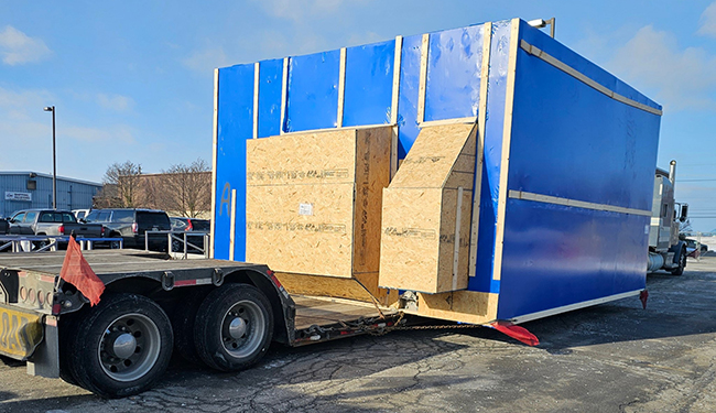 Buchanan Hauling heavy haul trailer positioned for stamping press transportation Buchanan Hauling heavy haul trailer positioned for stamping press transportation