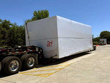 Heavy manufacturing press prepared for specialized trailer transportation Heavy manufacturing press prepared for specialized trailer transportation
