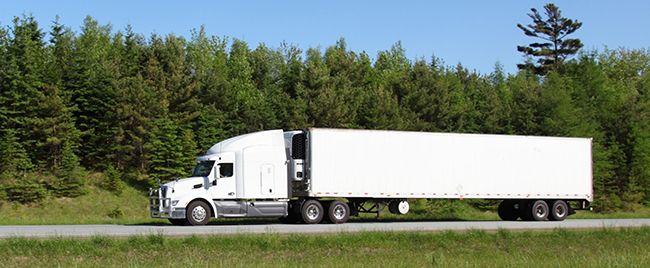 Commercial truck transporting time critical freight shipment.