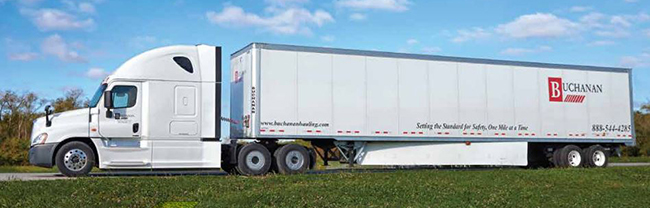 Commercial freight truck transporting cargo for supply chain logistics.