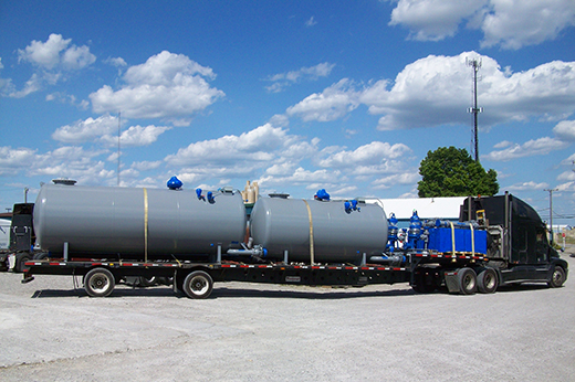 Oversized industrial boiler or pressure vessel prepared for heavy haul transportation