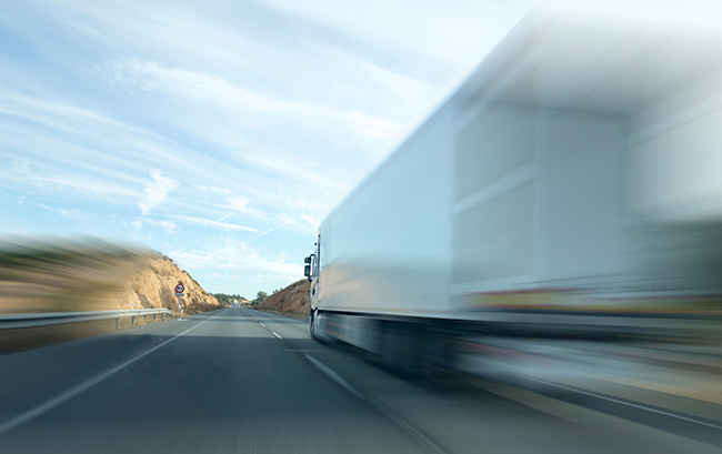 asset based trucking company fleet transporting freight across highway