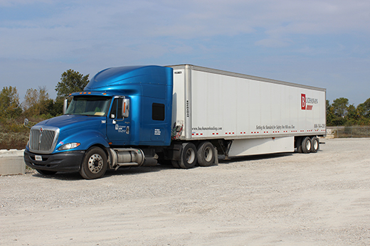 dry van freight transport hauling industrial equipment across the United States