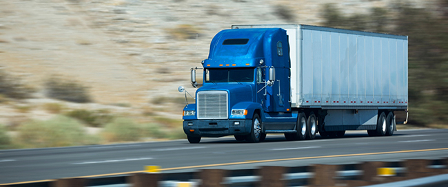 semi truck transporting expedited freight on interstate highway