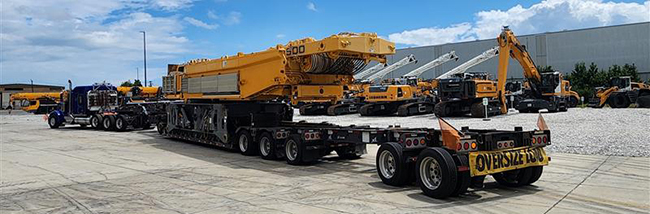 Heavy haul trucking transporting large infrastructure construction equipment