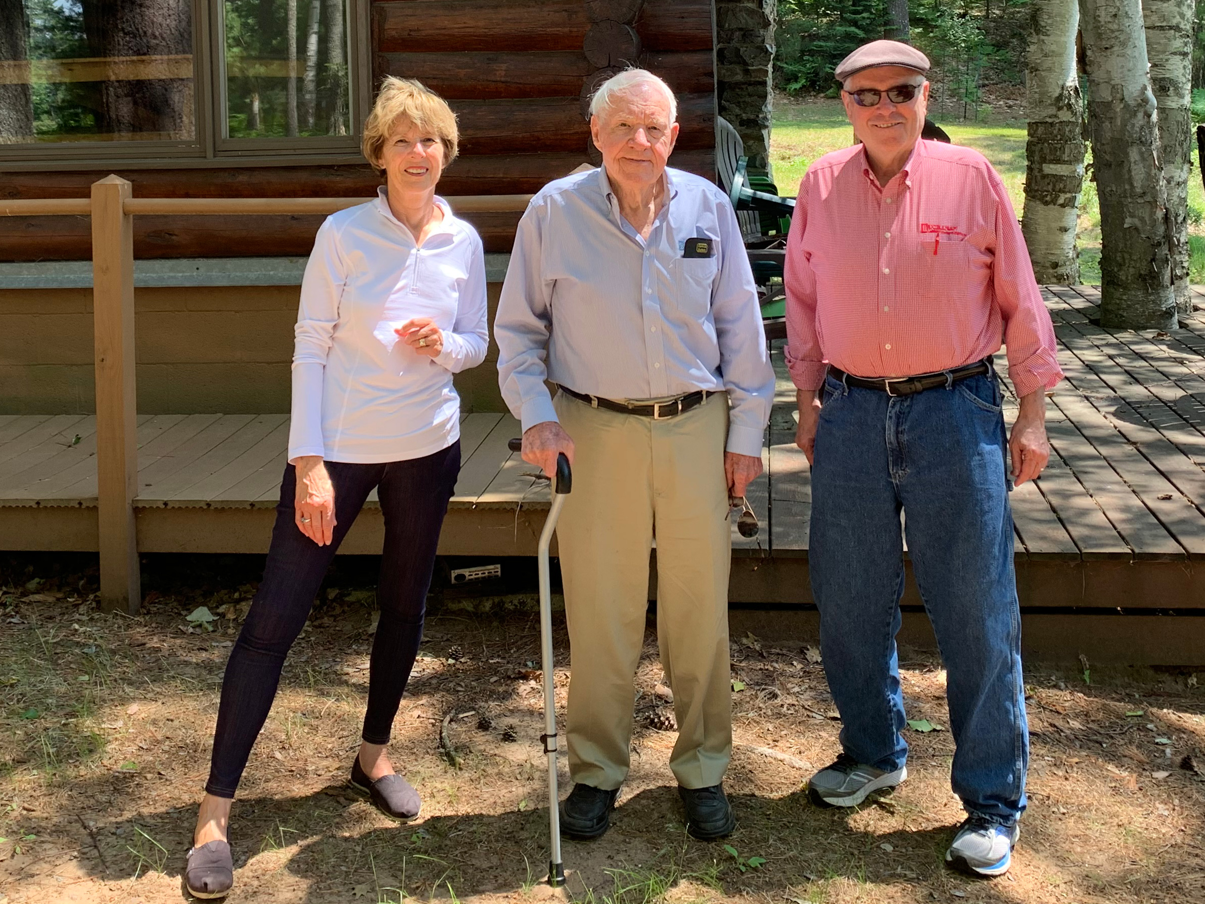 Becky Buchanan, Bob Jesse, and Geary Buchanan posing for a group picture