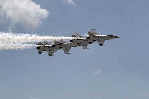 Thunderbirds flying in tight formation above Fort Wayne. Thunderbirds flying in tight formation above Fort Wayne.