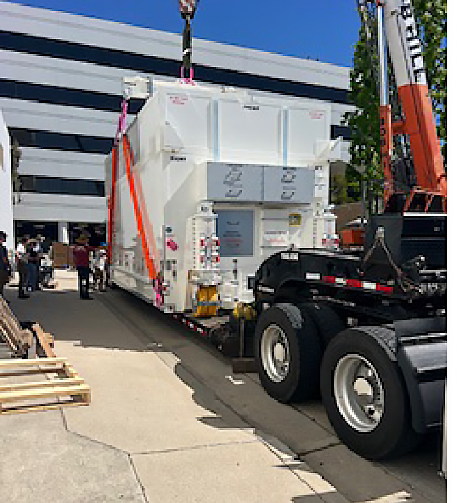 Buchanan Hauling and Rigging transporting satellite parts.