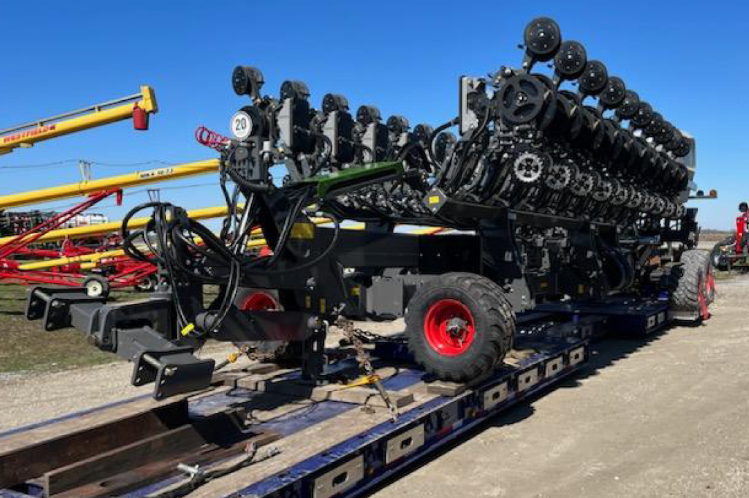 Tilling equipment transported by Buchanan Hauling & Rigging.