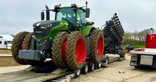 Buchanan Hauling using one of our RGN trailers to move a farm tractor. Buchanan Hauling using one of our RGN trailers to move a farm tractor.
