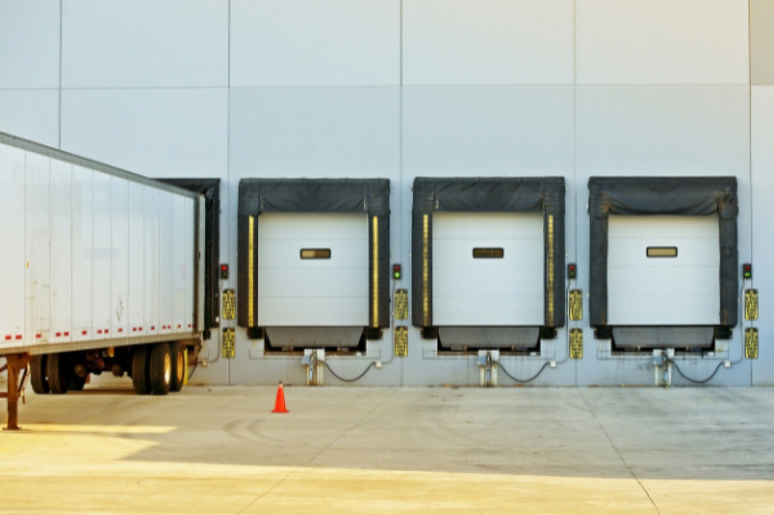 Buchanan trailer docked and picking up a load to head out for delivery.