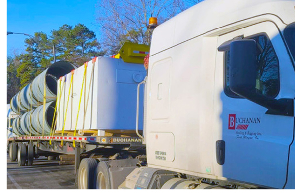 Buchanan flatbed truck filled with freight to be transported.