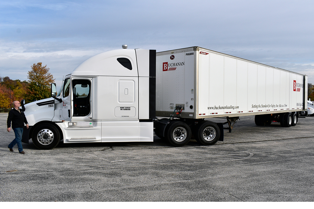 Buchanan truck driver checking over his truck before heading out with a load.