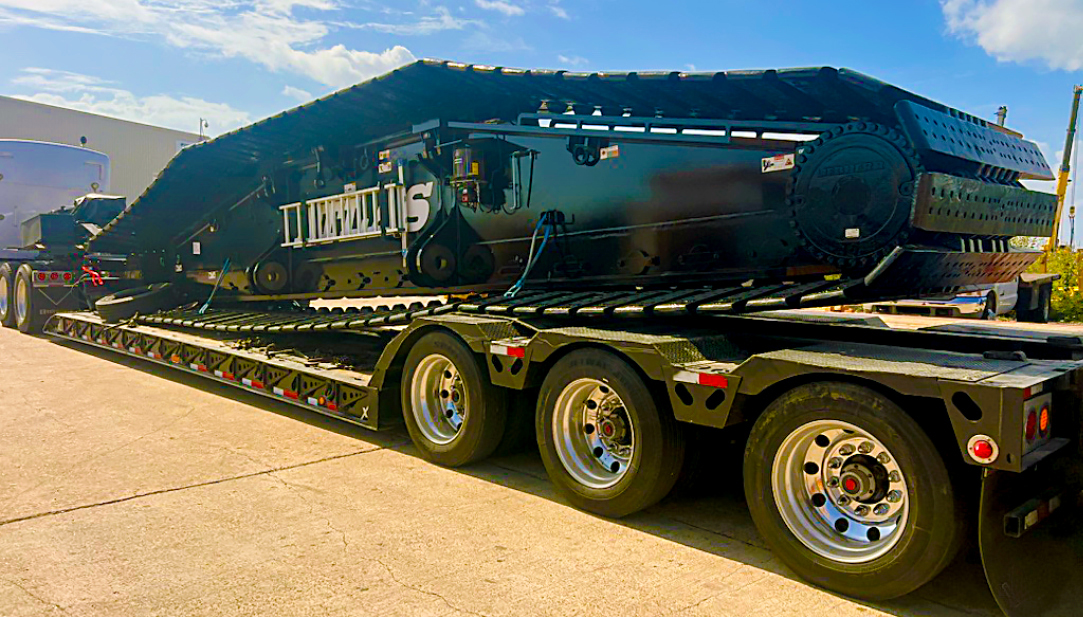 Buchanan Hauling and Rigging transporting a section of crane track to a jobsite.