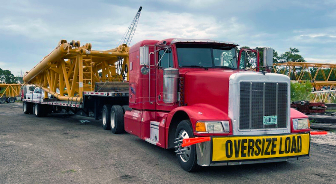 Buchanan Hauling and Rigging transporting a section of crane to a jobsite.