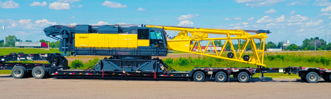 Buchanan Hauling and Rigging transporting a section of crane to a jobsite.