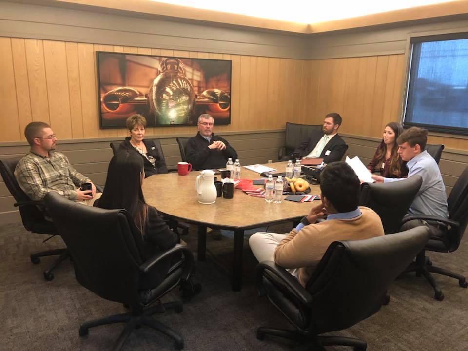 Geary meets with a group of college grads as they select either an internship or one of the many other positions at Buchanan.