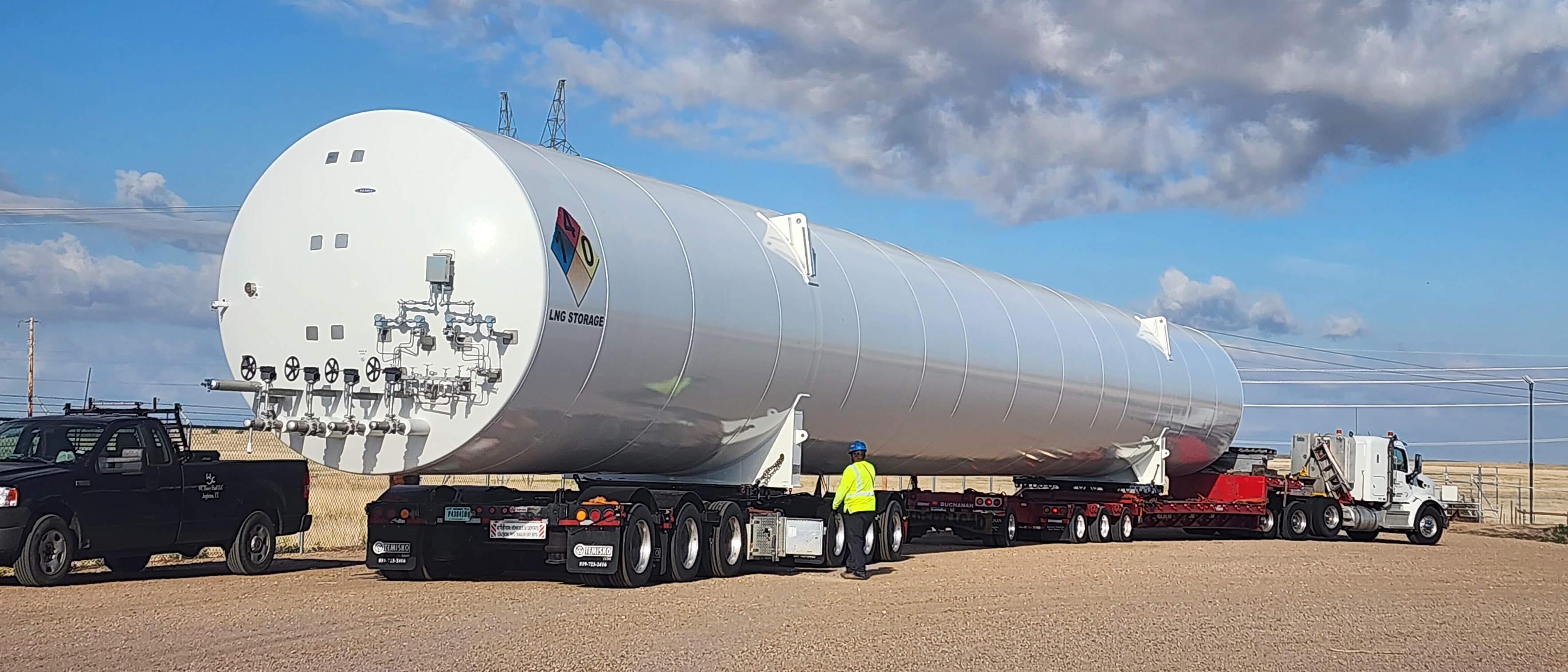 Buchanan Hauling Heavy Haul Division transporting a tank for gas or liquid storage.