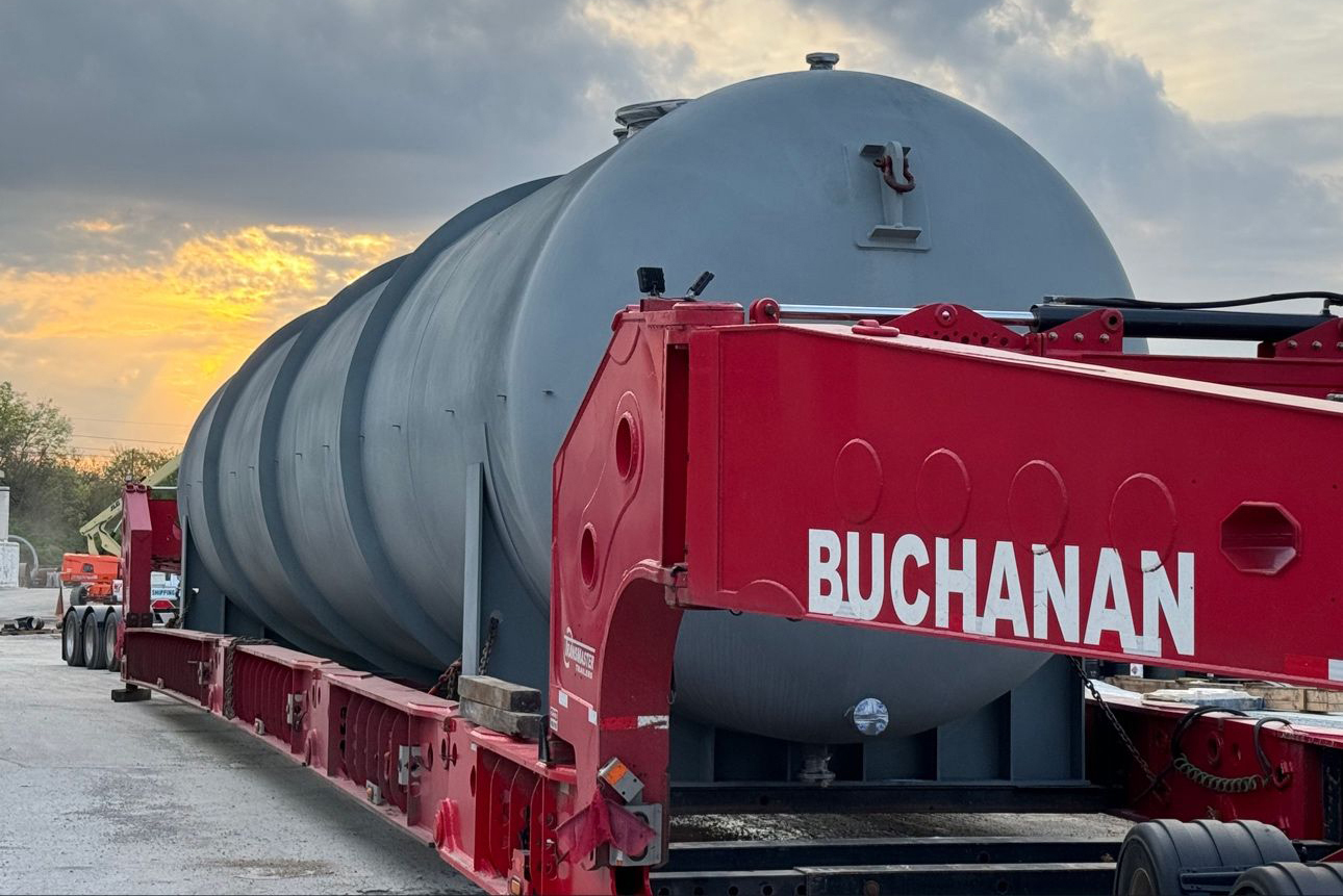 Buchanan Hauling Heavy Haul Division transporting a tank to be used to store liquids or gas.