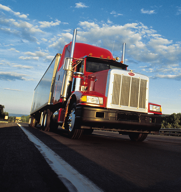 Semi on the road driving a dry van