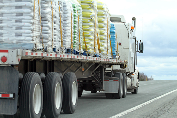 Flatbed truck carrying goods