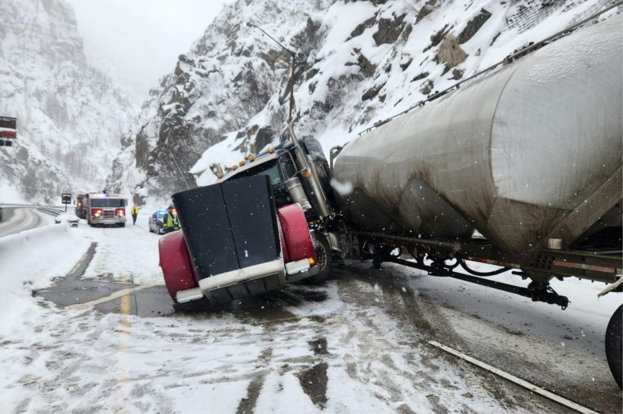 A truck that could not handle the icy inclement weather ends up in an accident.