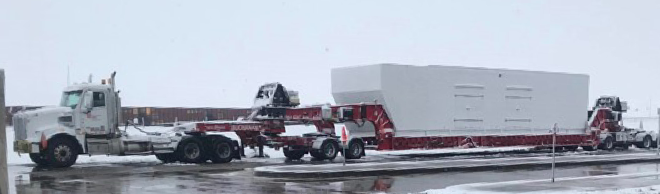 Heavy Haul truck hauling in the snow driving